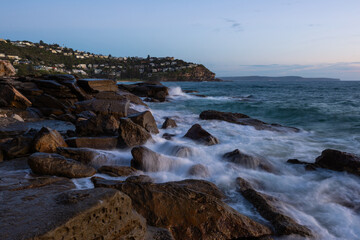 Morning view of the rocky shore of Whale Beach, Sydney, Australia.