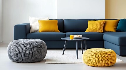 A modern living room featuring a dark blue sofa, vibrant yellow cushions, round poufs, and a minimalist coffee table on a light rug.