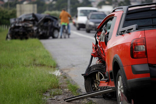Car is seen damaged in a highway shoulder after a traffic collision in Ayrton Senna road, Sao Paulo, Brazil.