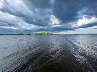 clouds over an lake in northern canada