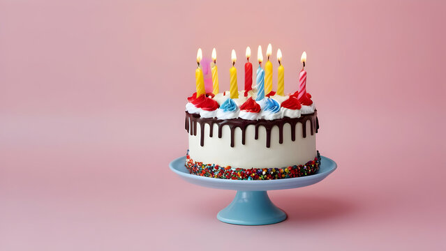 Celebration cake with glowing candles, ideal for a birthday background, featuring blank space for messages.