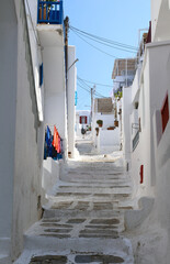 Fototapeta premium Mykonos, Greece: The steep steps leading to the upper reaches of the old Chora. 
