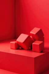 Obraz premium Red cubes on a soft red fabric with a subtle gradient effect, soft, fuzzy