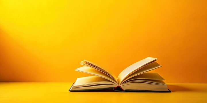 Minimalist Open Book on Yellow Background - Copy Space for Design