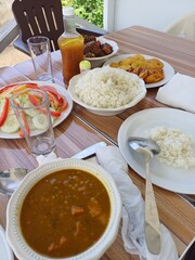 Dominican food, rice, pigeon peas and stewed chicken