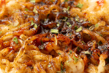 seasoning powder and oil on ripe instant noodles. Close-up