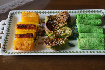 A plate of assorted traditional southeast asian desserts