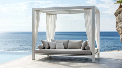 Fototapeta premium Daybed under a white pergola on the oceanfront with expansive views.