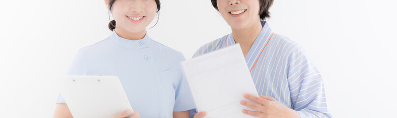 婦人科検診のイメージ　看護師と患者の顔無しのバナー