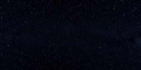 Fototapeta premium Night sky filled with sparkling stars against a black background, galaxy background, celestial, star background, Night sky with stars and galaxy in outer space, universe background