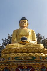 Golden statue of Buddha at Buddha Park, Swayambhunath, Kathmandu, Nepal