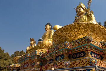 The Golden Buddha Statues in Buddha park, Swayambhunath area, Kathmandu, Nepal, the World Heritage Site declared by UNESCO