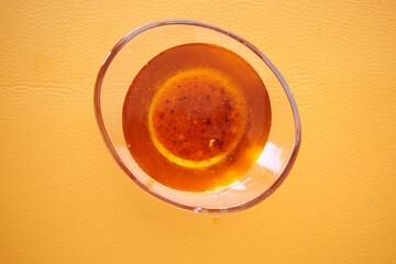 Used vegetable oil in a plate .