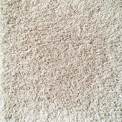 Soft, beige textured carpet for cozy interiors.
