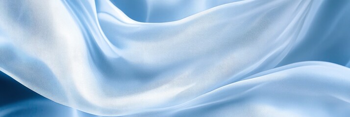 A closeup of light blue silk fabric in wavy texture
