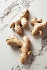 A piece of ginger root with a few bumps and ridges. It is a root vegetable that is often used in cooking