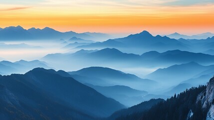 Obraz premium Misty Mountain Ranges at Sunset