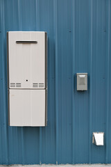 Exterior Mounted Gas Water Heater on Metal Building
