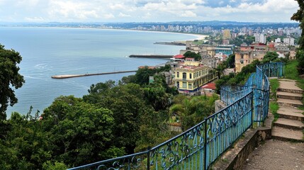 Coastal city panorama, hillside stairs, ocean view, tropical foliage, cityscape background