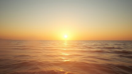 Beautiful orange light paints the sky and sea as the sun dips below the horizon
