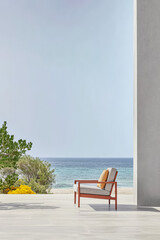 Relaxing seaside view from a modern deck chair overlooking the ocean at a tranquil beach