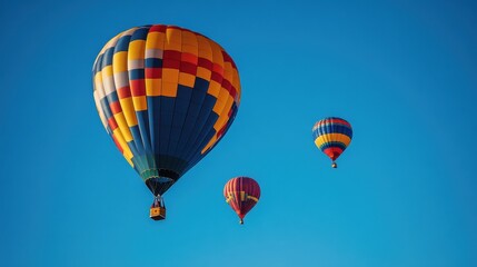 Naklejka premium Balloons flying into the blue sky, symbolizing freedom and joyful celebrations 