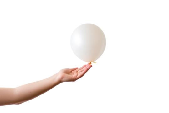 An artistic shot of a hand grasping a white balloon, just about to release it. The background captures the gentle motion of the balloon rising