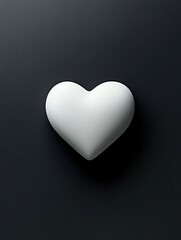Minimalist design featuring a simple heart shape in bold white on a dark gray or black background, clean, abstract