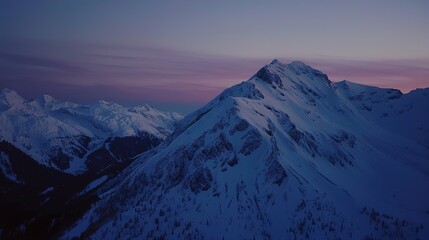 Scenic alpine landscape at dusk, majestic mountain peaks with serene views, peaceful nature scene capturing the beauty of twilight.