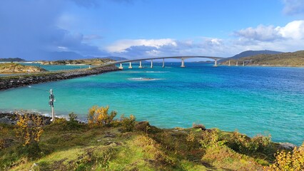 Bridge over the turquoise sea in northern Norway, beautiful scenery.