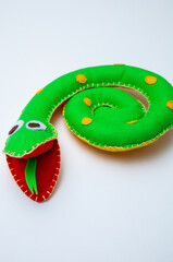 baby toy snake isolated. symbol 2025