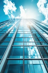 Obraz premium Glass skyscraper with blue sky