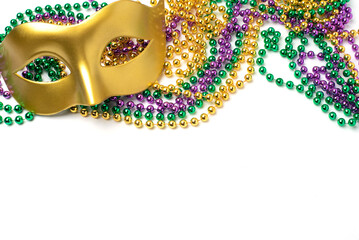 Mardi gras beads frame on white background © Anna