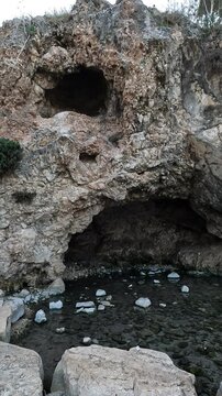 Gideon's Spring emerging from a cave in Ein Harod National Park, located in the picturesque Beit Shean Valley, Israel. A stunning natural and historical gem.
