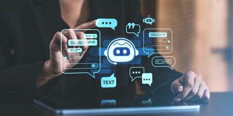 Businessperson interacting with chatbot interface on tablet screen.