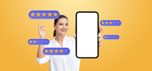 Woman holding smartphone displaying blank screen with star ratin