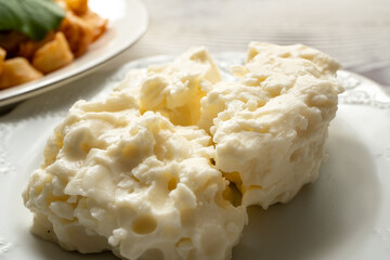 white cheese and pasta side by side