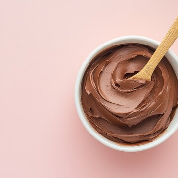 mocha mousse - color of the year 2025. Homemade chocolate mousse souffle in a bowl with wooden spoon. ai generated