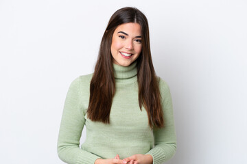 Young Brazilian woman isolated on white background laughing