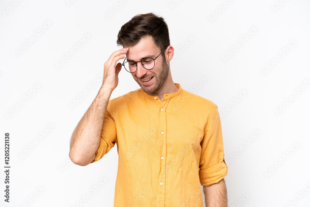 Wall mural Young caucasian man isolated on white background laughing