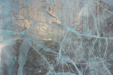 frozen natural translucent glowing glacier crystals, macrostructure of transparent ice close-up, iceberg ice