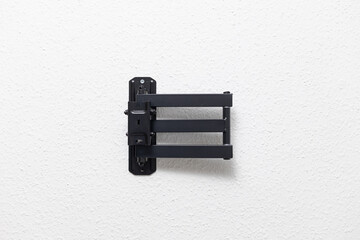 TV bracket on a white wall
