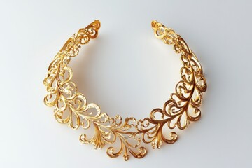 Obraz premium Gold necklace on white surface