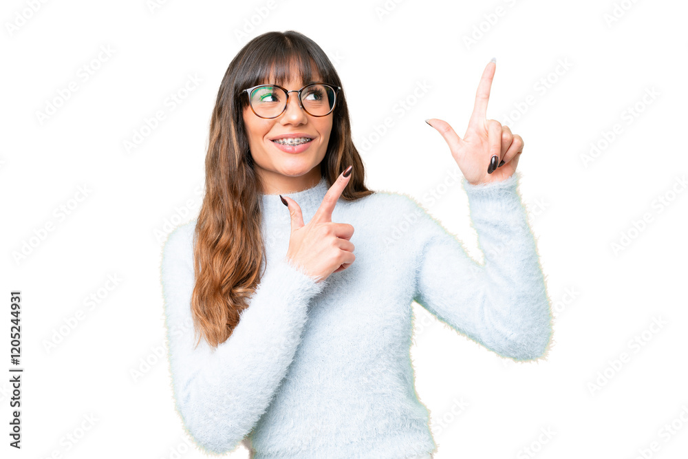 Canvas Prints Young caucasian woman over isolated chroma key background pointing with the index finger a great idea