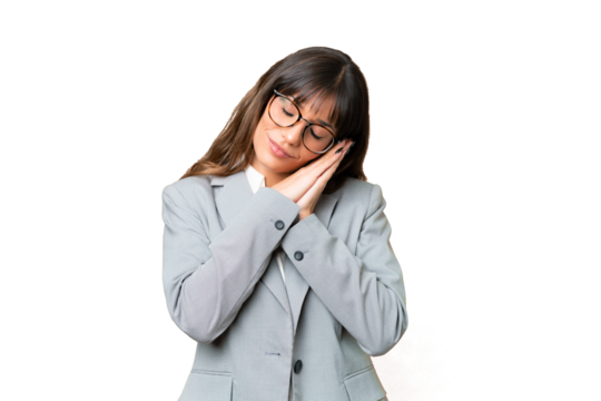 Young caucasian woman over isolated chroma key background making sleep gesture in dorable expression