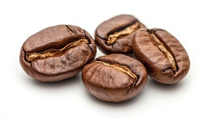 Obraz premium Coffee beans on white background closeup with roasted texture and aroma