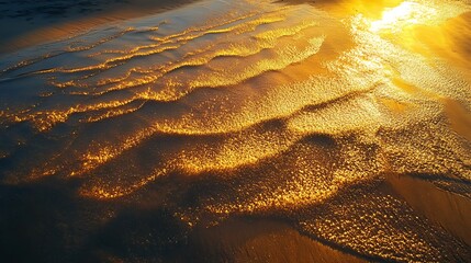 The serene beauty of glowing golden sands under a brilliant sunset