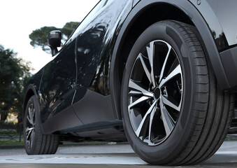 Car showroom. Aluminum wheel with Tire. automobile wheel tire. aluminium rims. Motor Corporation is Japanese automotive manufacturer. BATUMI, GEORGIA