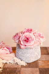 Traditional floral decoration with pink roses.