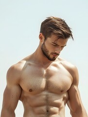 Fototapeta premium Muscular,Sculpted Physique of a Fit,Athletic Man in a Studio Setting